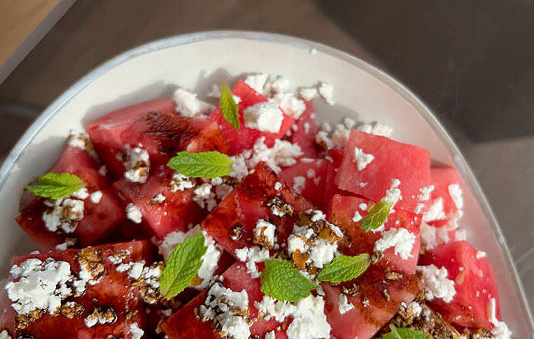 Balsamic & Feta Watermelon Salad plated on a serving dish.
